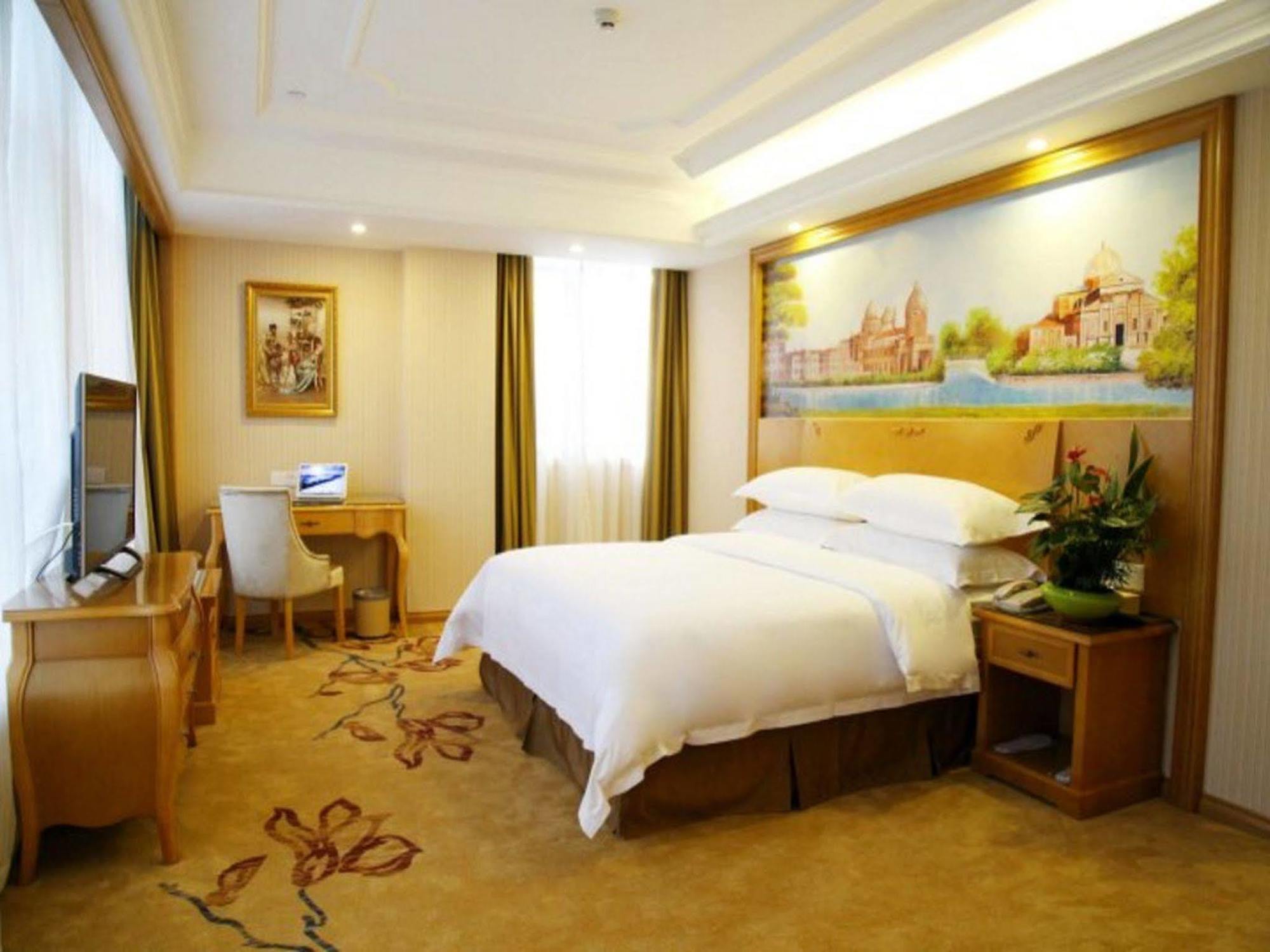 Vienna International Hotel Meizhou Spindle Bridge Branch Esterno foto